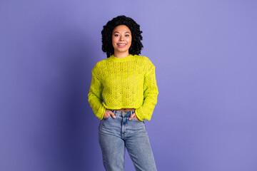 Photo portrait of lovely young lady posing hands pockets dressed stylish yellow garment isolated on...
