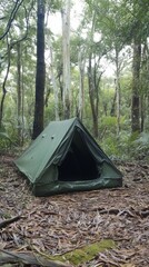 A green tent set up in a dense forest, surrounded by lush trees and natural foliage, perfect for camping enthusiasts.