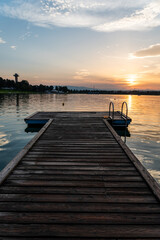 Obraz premium Lake schwarzl sunset panorama schwarzlsee near the styrian capitol Graz in Austria.