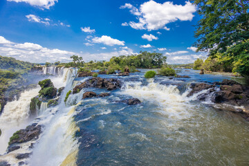 Iguazu waterfall landscape in the tropical jungle. Iguassu falls in South America. Cataratas do Iguacu