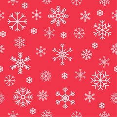 Christmas snowflakes seamless pattern on red background