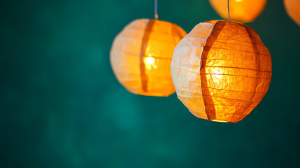 Fototapeta premium Crumpled paper lanterns glow with warm light against a teal background. Illuminated Paper Lanterns. Illustration