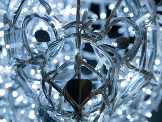 Heart shaped lights on a Christmas tree with bokeh background.
