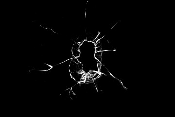 bullet hole on glass black background for overlay, transparent window