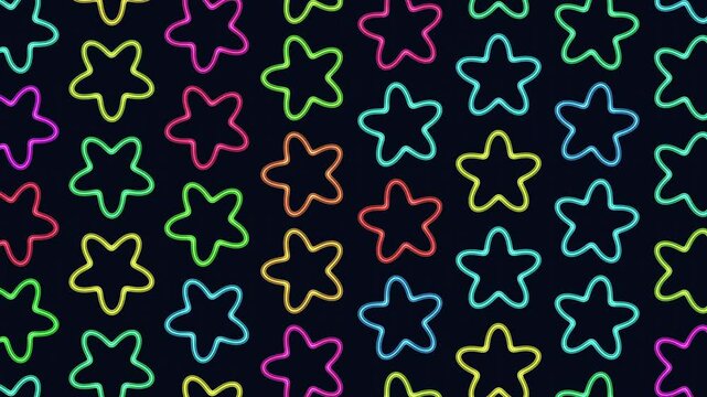 Colorful stars create a vibrant pattern against a black background in this captivating image, providing a striking visual display