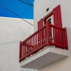 red and white balcony with staircase