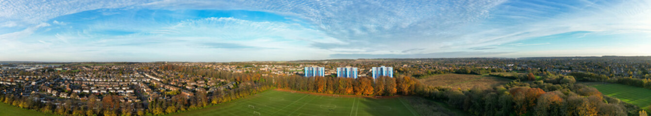 Fototapeta premium Aerial Panoramic View of Luton City During Orange Sunset Time