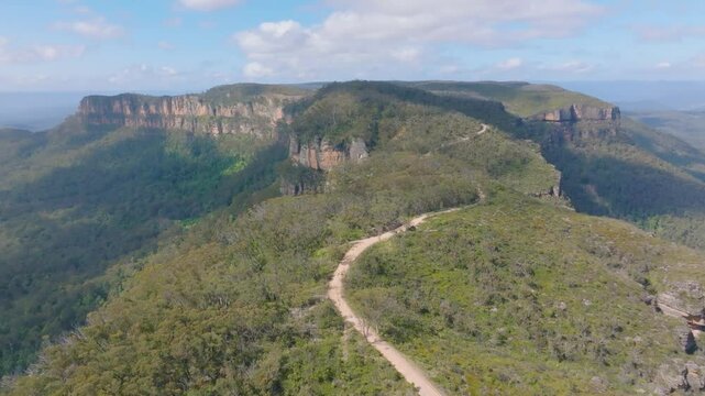 Drone aerial footage of the scenic Narrow Neck Plateau and Peninsula located between Jamison Valley and Megalong Valley near Katoomba in the Blue Mountains in New South Wales, Australia.