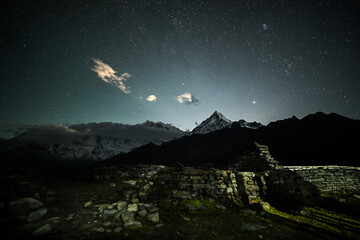 Annapurna south peak under a starry night seen from Khopra Danda, Nepal