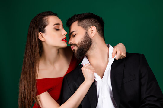 Photo of stunning young girl guy couple seductive unbutton shirt collar wear trendy fancy classy outfit isolated on green color background