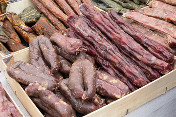 Smoked sausage on the counter close-up