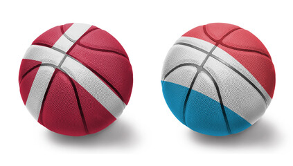 basketball balls with the national flags of luxembourg and denmark on the white background.