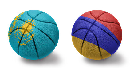 basketball balls with the national flags of armenia and kazakhstan on the white background.