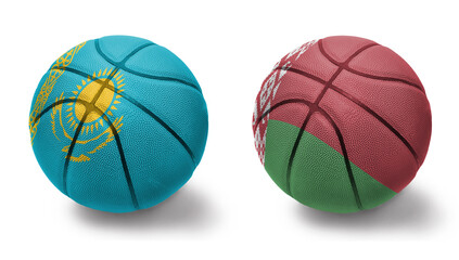 basketball balls with the national flags of belarus and kazakhstan on the white background.