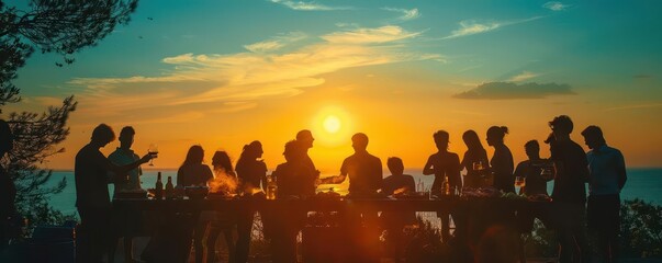 A silhouette of a group at a barbecue, with a background of a summer sunset