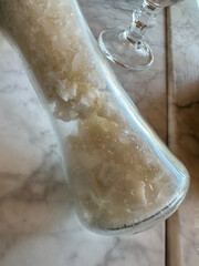Salt Crystals Drawing Moisture. In A Clear Salt Shaker