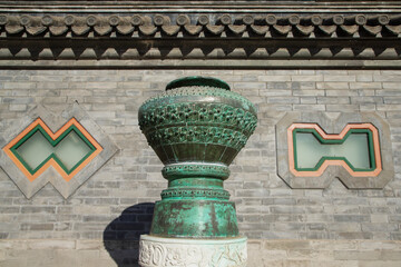 Bronze cultural relics on display outside the gate of Summer Palace Museum in Beijing.