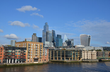 Fototapeta premium London, England, United Kingdom - October 2024: Panoramic view of Bank, London's leading financial district with blue sky and clouds autumn or fall