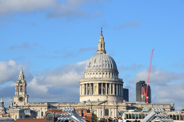 Obraz premium London, England, United Kingdom - October 2024: St. Paul's Cathedral and Millenium Bridge in London