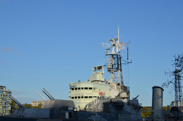 Fototapeta premium London, UK - February 19, 2024: HMS Belfast, a light cruiser built for Royal Navy, now permanently moored in the River Thames as a museum ship, London, England.