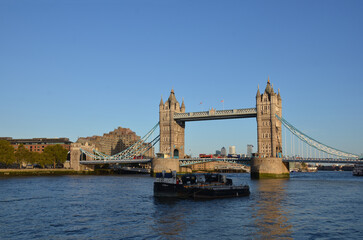 Obraz premium London, England, United Kingdom - October 2024: Tower Bridge is a bascule, suspension bridge built between 1886 and 1894. One of the prominent symbols of the United Kingdom.
