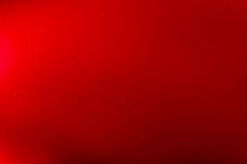 Obraz premium red background with a pattern. Colorful red gradient blurry abstract background.