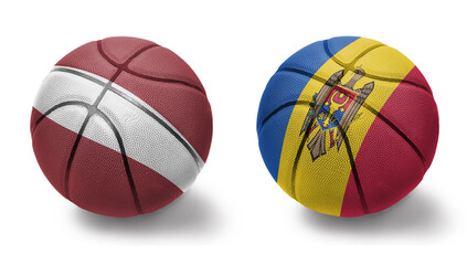 Obraz premium basketball balls with the national flags of moldova and latvia on the white background.