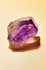 Polished amethyst gem display isolated on soft background jewel concept