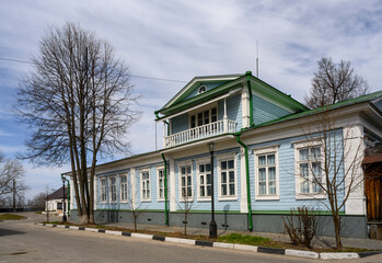 GORODETS, RUSSIA - APRIL 17, 2023: Wooden house built in 19 century with carved platbands