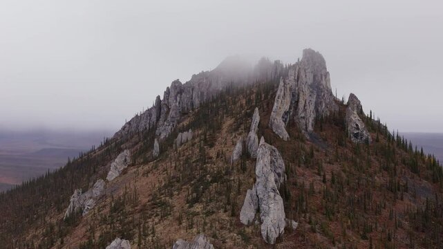 Rocky Sapper Hill Of Ogilvie Mountains In Canada - Aerial Shot