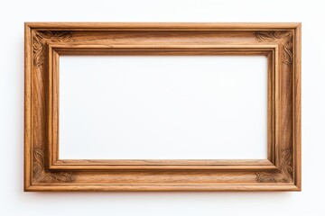 Fototapeta premium Elegant wooden picture frame on white wall
