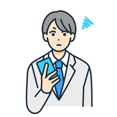 Fototapeta premium 不愉快な気分。怒る男の子。スマホを手にするブレザー姿の学生。