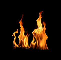 Fototapeta premium Abstract flame isolated on black background. Burning effect. Flames in the night sky.