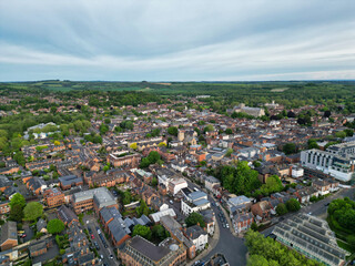 Fototapeta premium High Angle View of British Historical City of Winchester Central During Sunset, England United Kingdom, Aerial Footage Was Captured with Drone's Camera From Medium High Altitude on May 17th, 2024
