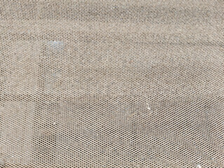 a close up image of a textured surface with a repeating hexagonal pattern, reminiscent of a...