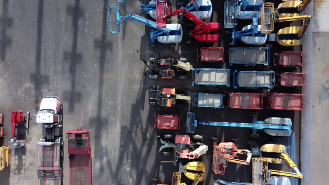 Overhead View of Boom Lifts and Scissor Lifts in an Industrial Yard