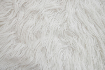 Texture of white faux fur as background, closeup. High quality photo