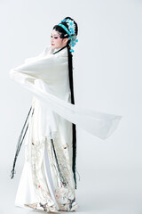 Beautiful Asian woman in traditional Yue opera costume on white background