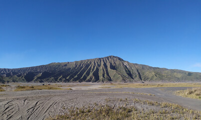 Rugged mountain in Indonesia under clear blue sky