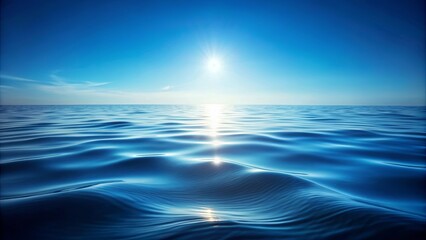 Obraz premium Serene Seascape of Gently Rolling Waves under a Clear Sky with the Sun Glimmering on the Horizon