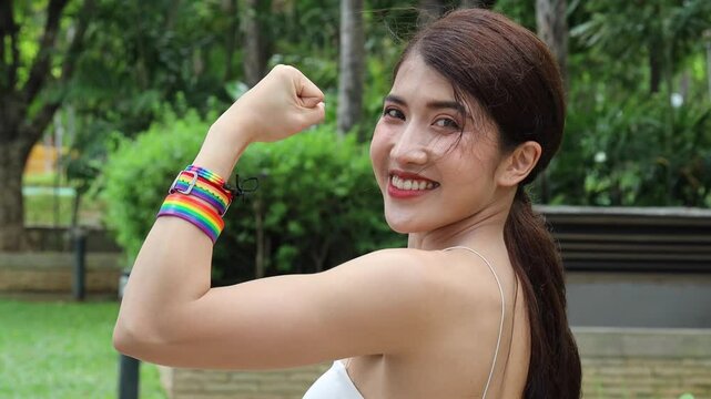 Strong and confident non-binary LGBT person showing confident and empowering expression for LGBT awareness pride month