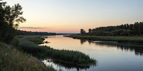 Obraz premium Peaceful evening scene with a calm river, gentle flow, misty atmosphere