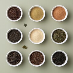 2409_084.An assortment of whole, uncropped gourmet tea varieties on  pale sage background, view from above, showcasing diverse varieties, arranged with space around each gourmet tea varieties,