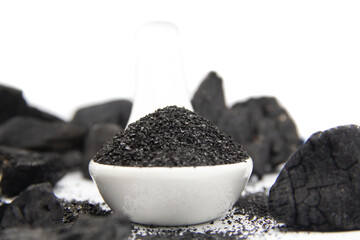 spoon with activated carbon granules