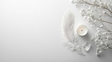 Minimalist composition featuring feather candle crystal on light background