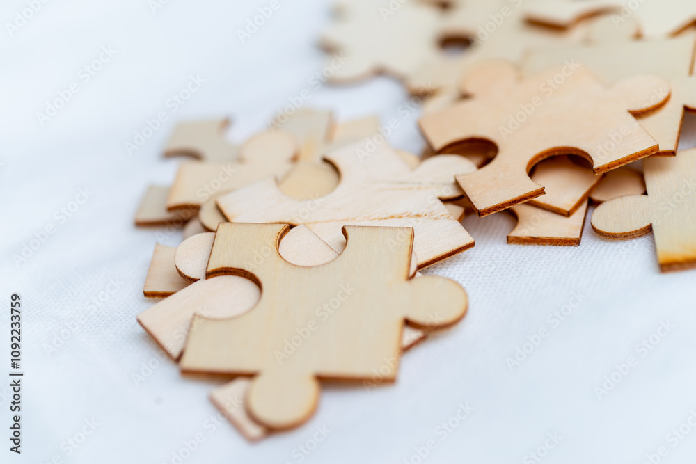 Poster strategizing business growth puzzle pieces of success in a creative workspace environment