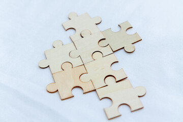 Obraz premium Strategic business planning office workspace puzzle pieces collaborative environment close-up problem-solving concept