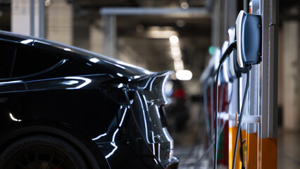 EV charger and electric car, Electric car charger station for charge ev battery, Plug for vehicle...