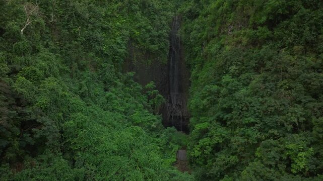 Vairao Taiarapu Vaimahutu Faarumai Matiti Waterfall Falls Tahiti Island aerial drone French Polynesia road to Teahupoo dense lush green jungle forest Les Trios Cascades pool nature forward motion