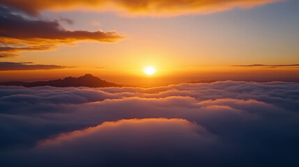 Obraz premium Breathtaking sunset over clouds, showcasing vibrant colors and serene atmosphere, perfect for relaxation and inspiration.